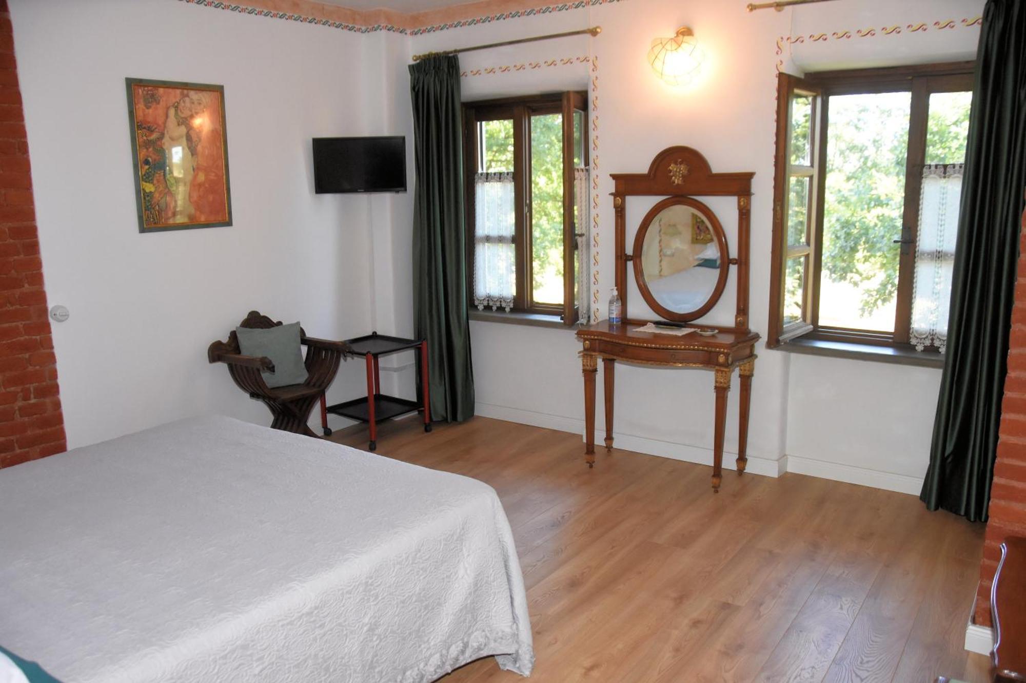 Guest House La Carolina Tigliole Bagian luar foto